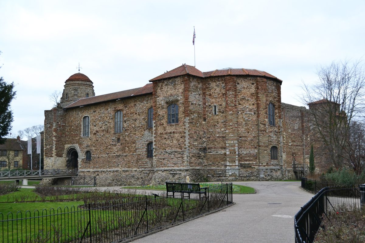 The Norman keep of Colchester Castle in Castle Park, with a Union flag flying from the roof